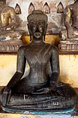 Vientiane, Laos - Wat Si Saket, The gallery around the sim houses thousands of Buddha statues in various mudras, dating  from the 16th century. 